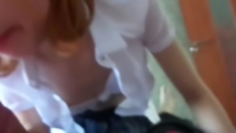 Horny Redhead In School Uniform Gives A Blowjob 