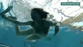 Podvodkova Swimming In Blue Bikini In The Pool