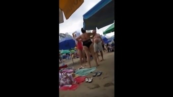 Young Skinny Girl With Thong On The Beach!