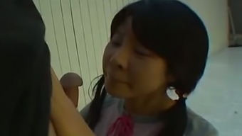 Pigtailed Japanese Teen Haruka Aida Stands On Knees To Suck Delicious Dick