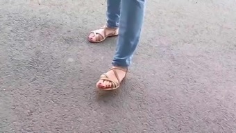 Candid Feet Of A Secretary In Sandals