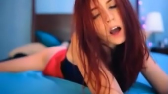 Beautiful Redhead Fingers Herself To Agony