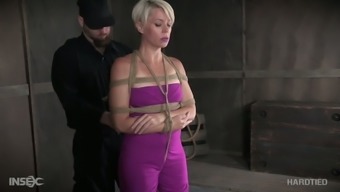 Tied Up And Kinda Bent Over Right Above The Floor Whore Helena Locke Is Masturbated
