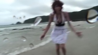 Asian Hottie Blows Her Man At The Beach