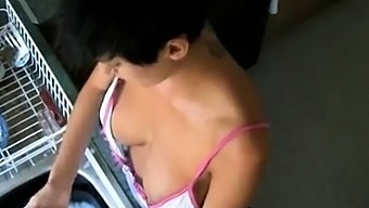 Downblouse Of Kim Doing The Dishes