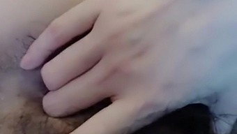 Leggy Chinese With Hairy Cunt Gives Dildo Footjob And Lays With Her Pussy