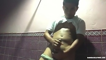 Already Boned Latin Boy Avrool Leans Against A Wall, Pulls His Shirt Down And Pulls Down His Shorts To Release His Stiff Meat. Then He Gets Naked And Starts Stroking That Big Uncut Cock Again.