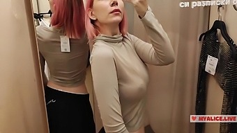 Clothed In See-Through Lingerie, A Redhead Shows Off Her Body In A Mall