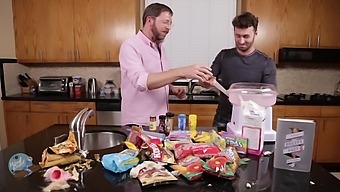 Hd Video Of Two Men Cooking And Consuming Food In The Kitchen, With A Focus On Oral Activities.