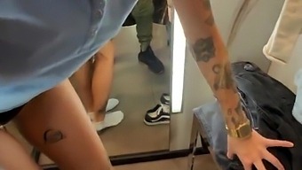 A Lecherous Female Gives A Blowjob In The Fitting Room For Some New Garments.