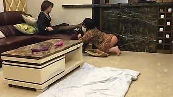 Mature Asian Woman In Stockings Humiliates Crossdresser With Sex Toy On The Floor
