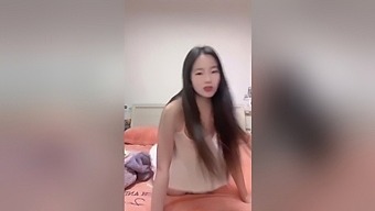 Small-Titted Asian Teen Girl Explores Her Sexuality