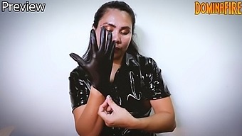 Asian Bdsm With Gasmask And Latex Gloves