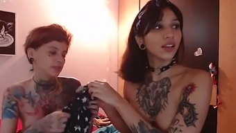 Two Inked Latinas Get Steamy On Webcam With Their Shaved Pussies